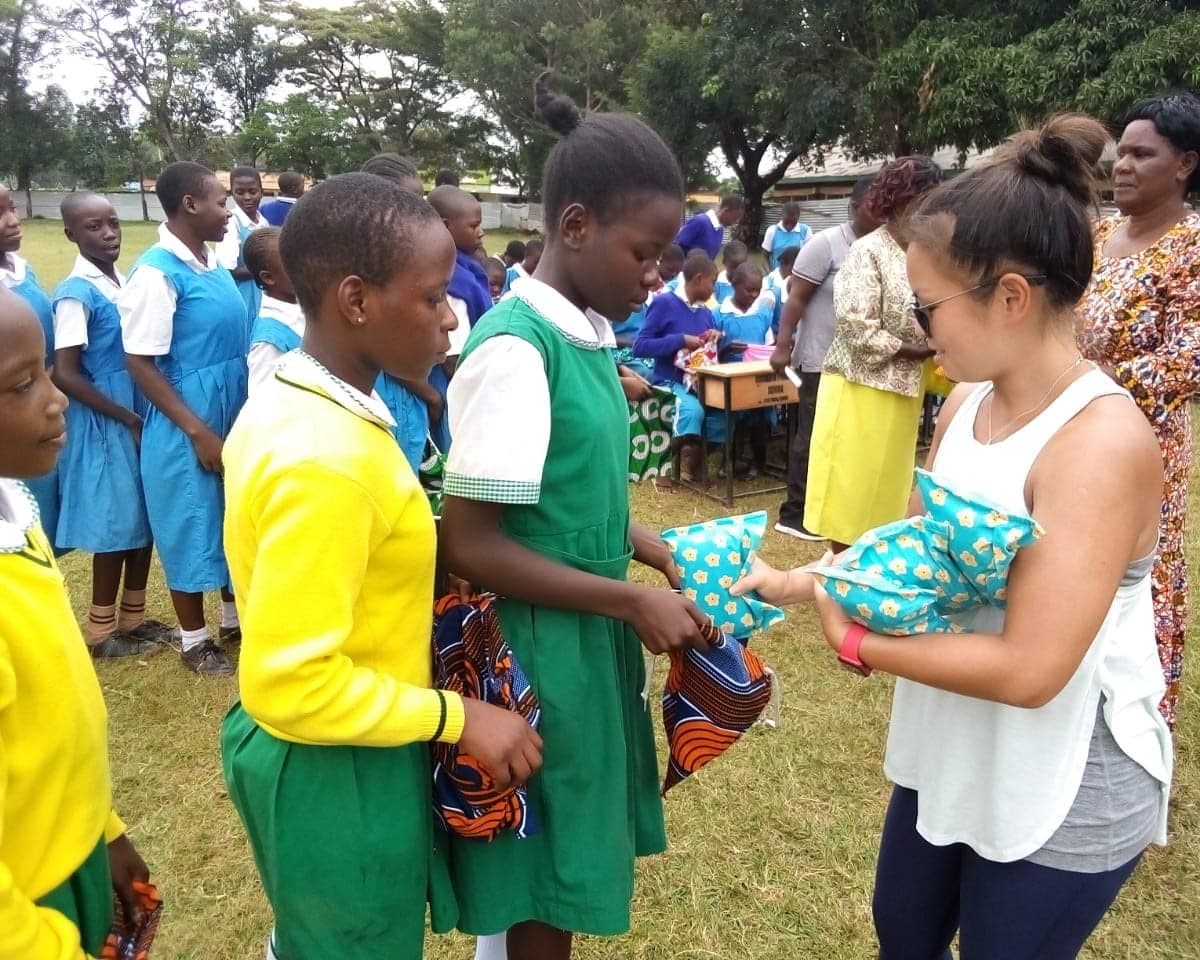 Students receiving sanitary pad kits