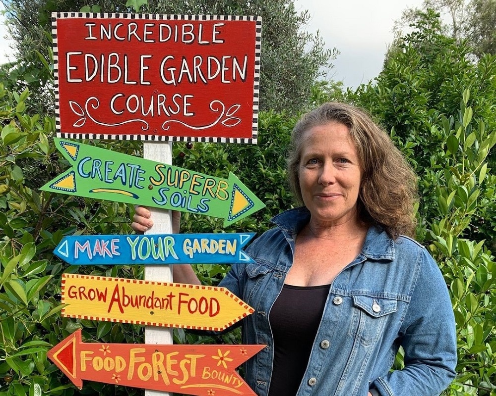 Morag with The Incredible Edible Garden course sign